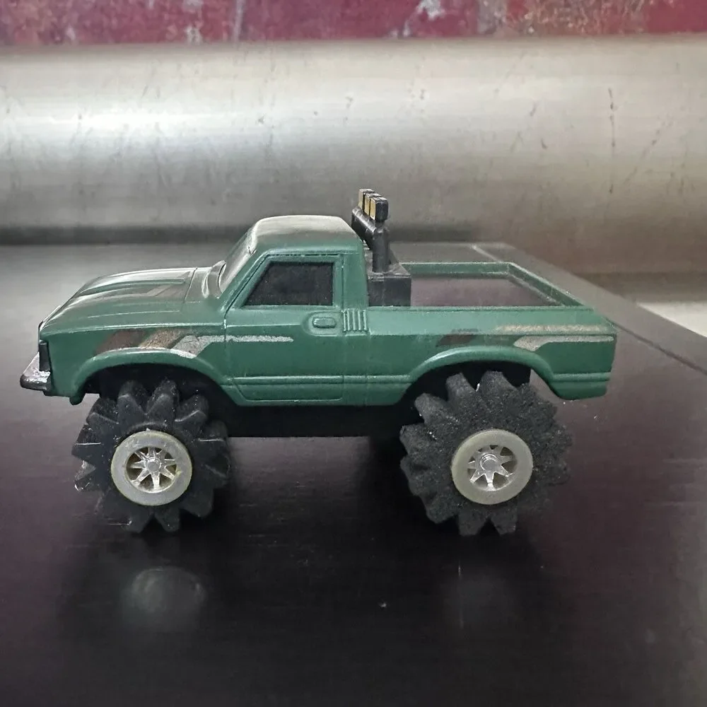 Schaper Stomper 4x4 Toyota SR5 Green Pickup Truck Works